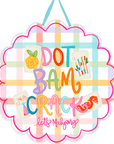Colorful sign with 'Dot Bam Crack' text and decorative elements on a white background