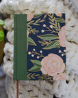 ESV Single Column Journaling Bible® | Stained Glass Blooms book with floral design on a textured surface