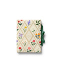 Stationery Gift box with floral design and green ribbon on a white background