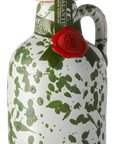 A ceramic bottle of Galantino Olive Oil, featuring a white speckled body with green leaf patterns, a wooden cap, and a red wax seal.