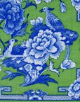 Blue Chinoiserie design on a green background paper dinner napkin