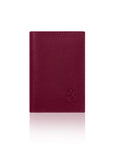 Burgundy leather red plumb leather passport cover on a white background