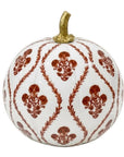 A decorative ceramic pumpkin with a white glaze, featuring a brown damask-style floral pattern and a small metallic gold stem, shown against a plain white background.