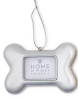 Silver dog bone frame with silver string with statement "Home is where the dog is" in window.