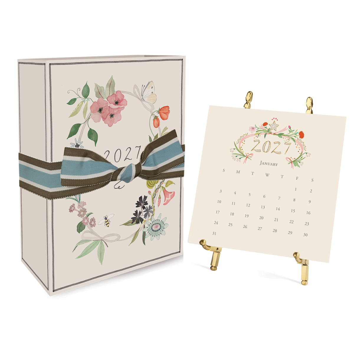 A decorative 2027 desk calendar set shown with its illustrated storage box and a single standing calendar page on a white background.