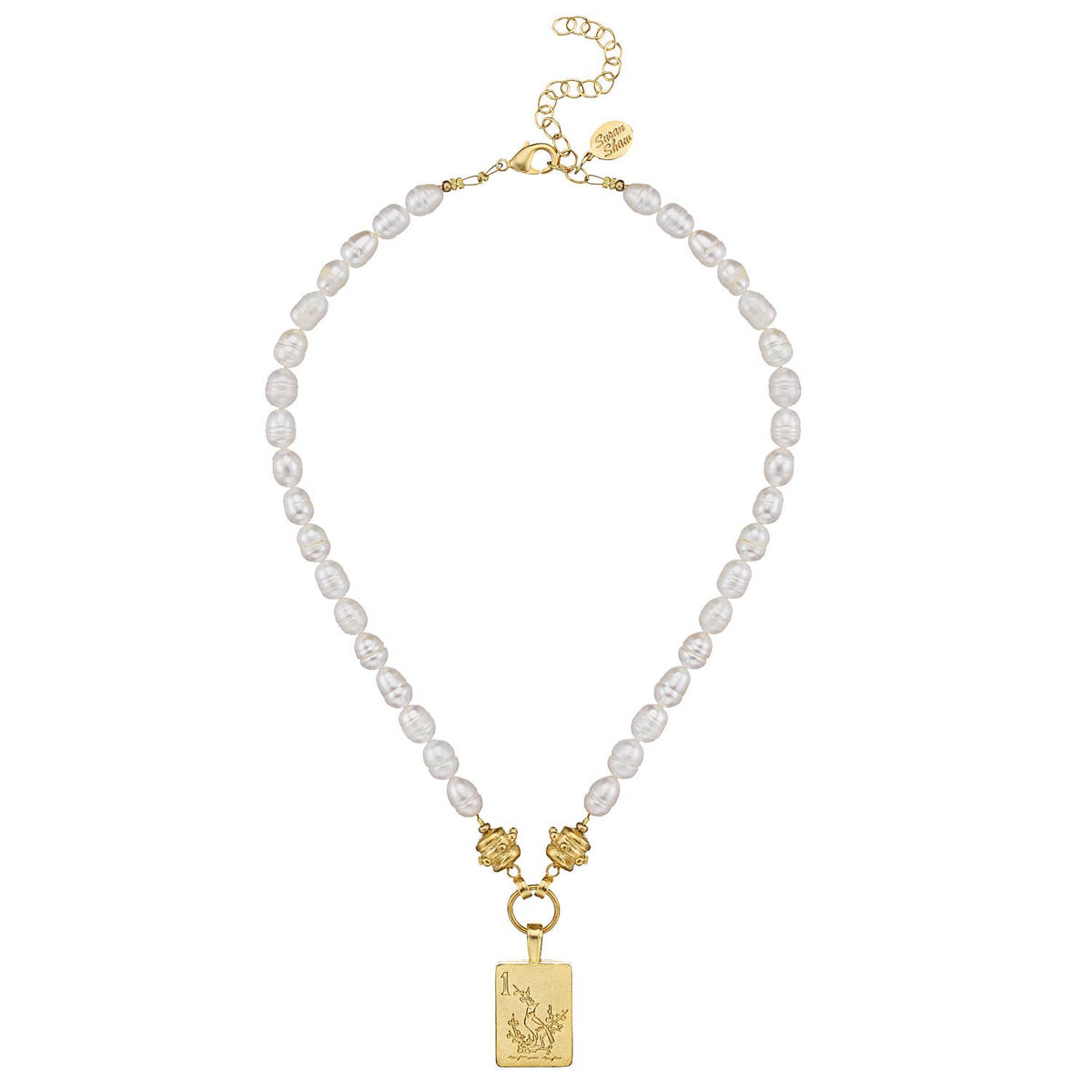 Pearl necklace with gold clasp and mahjong tile pendant on a white background
