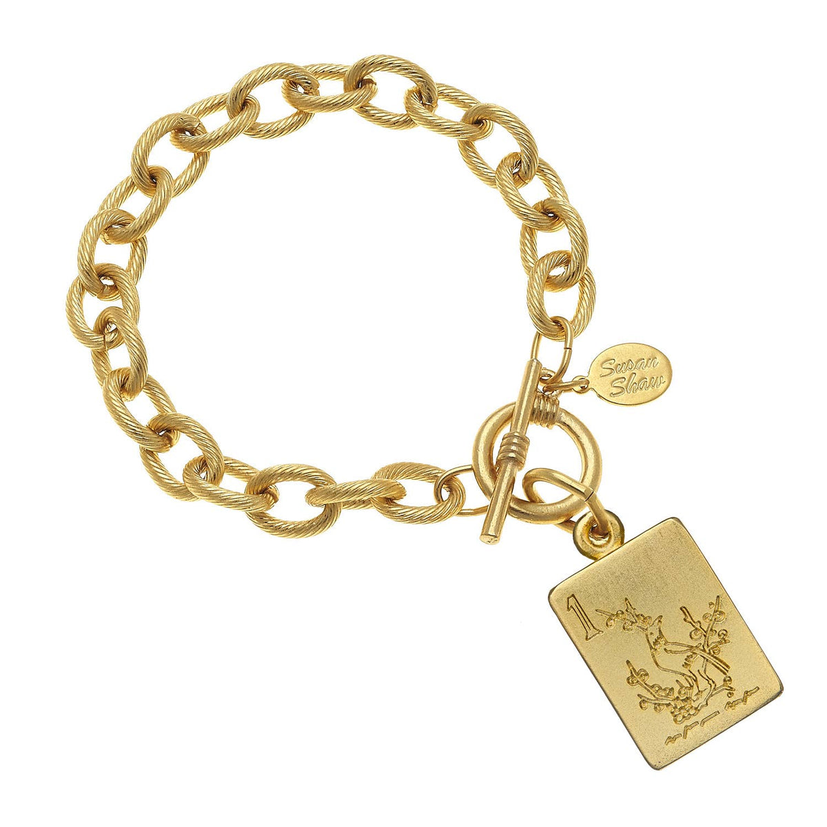 Gold chain bracelet with a mahjong tile on a white background