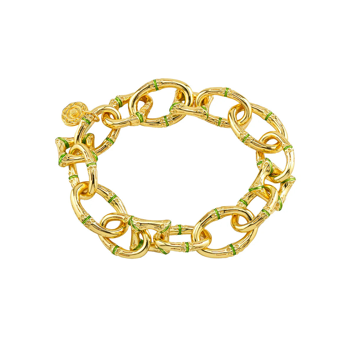 Gold chain bracelet with green accents on a white background