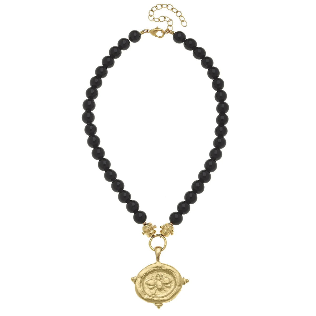 A gold-colored necklace with a bee-shaped pendant, featuring black stones and a gold-tone clasp.