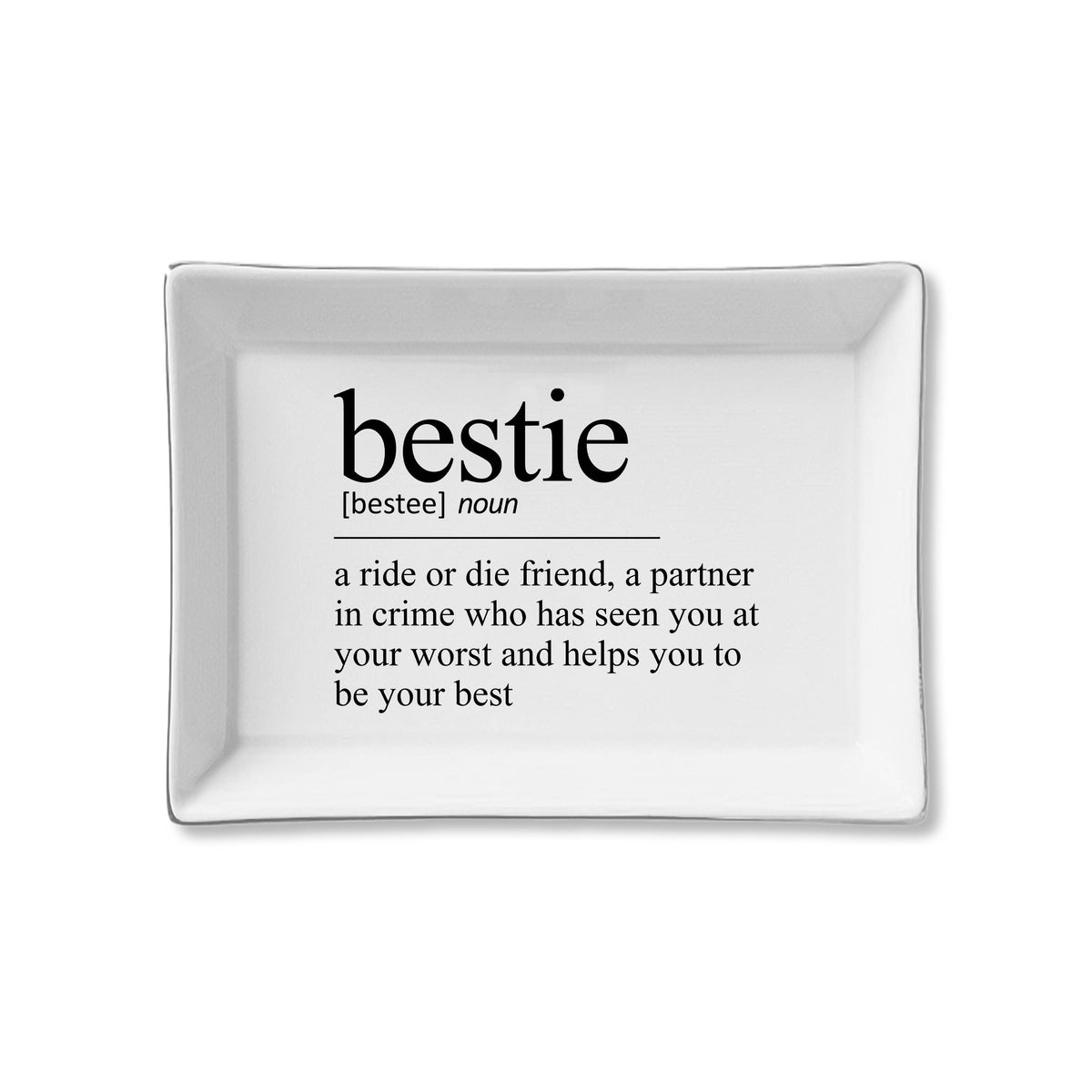 White decorative tray with black text definition of 'bestie' on a white background