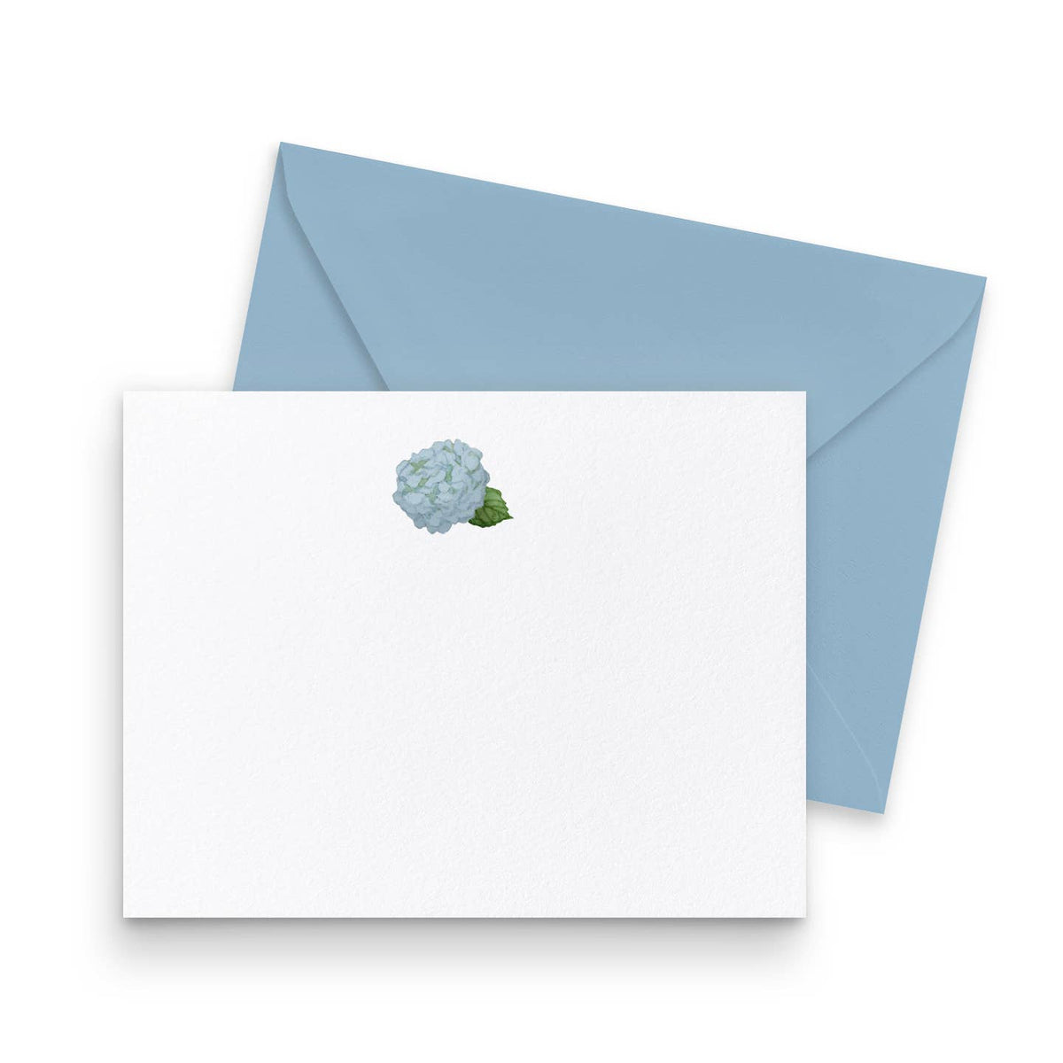 White card with floral design and blue envelope on a white background