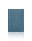 Blue leather passport cover on a white background