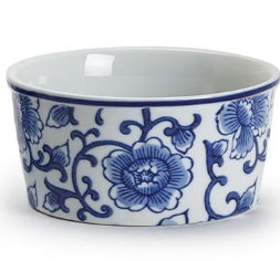 Ceramic bowl with blue floral patterns on a white background