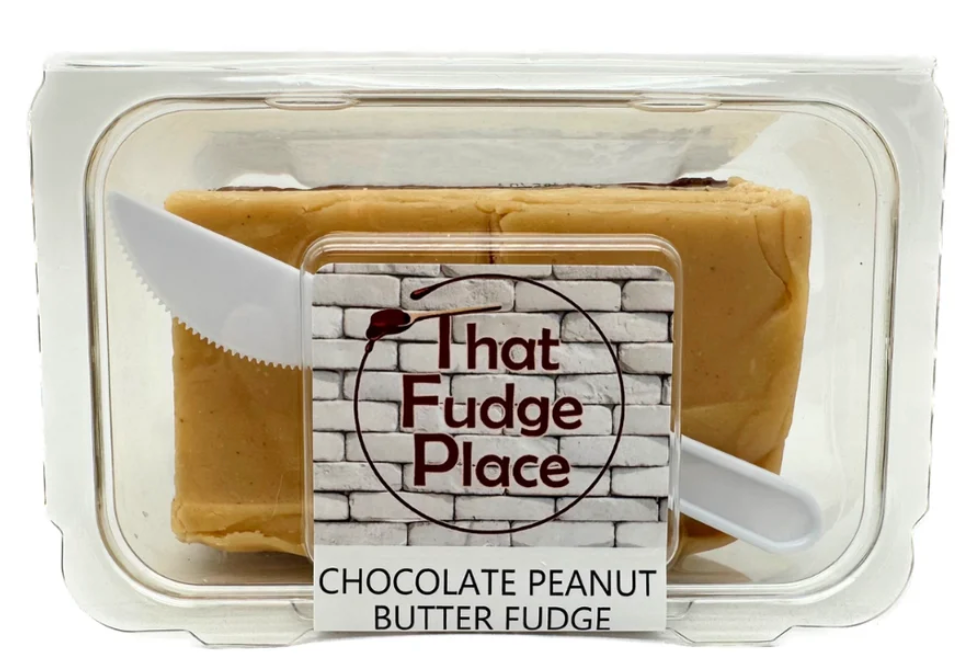 That Fudge Place Chocolate Peanut Butter Fudge in plastic container with small white plastic knife enclosed
