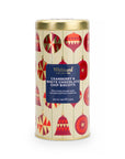 A cylindrical tin of Whittard Collection Cranberry & White Chocolate Chip Biscuits, decorated with a festive pattern of red Christmas ornaments on a cream background with gold vertical stripes, topped with a metallic gold lid.