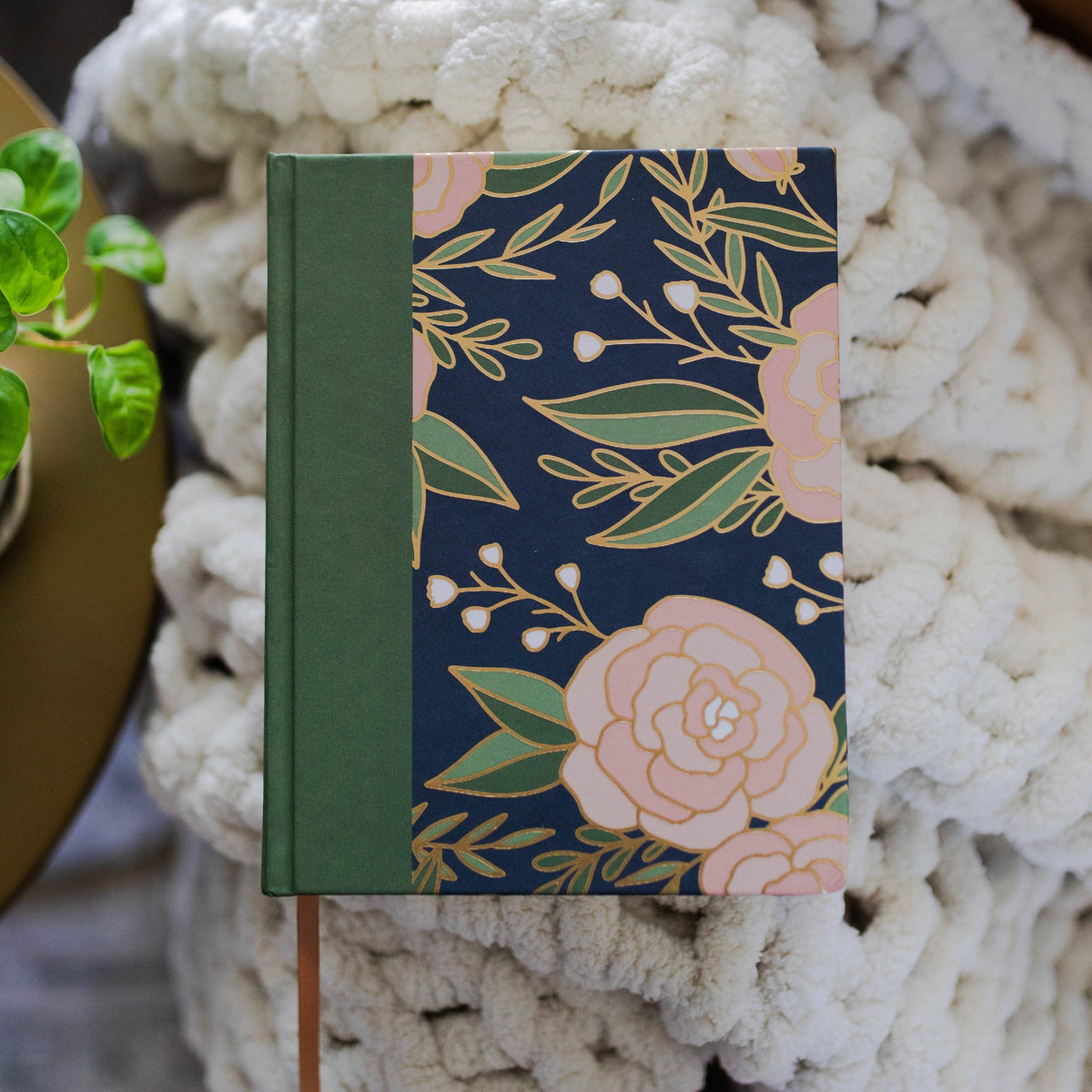 ESV Single Column Journaling Bible® | Stained Glass Blooms book with floral design on a textured surface