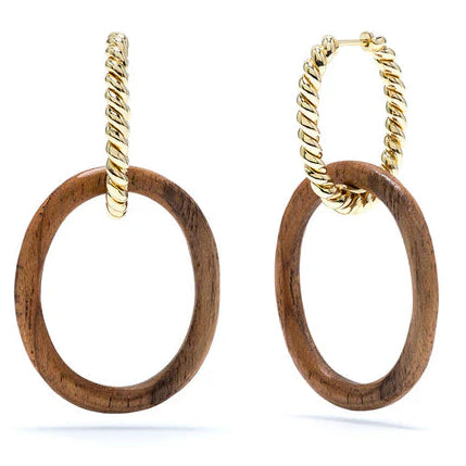 A pair of gold-colored, circular link chain earrings made from hand-carved teak wood, displayed against a white background.