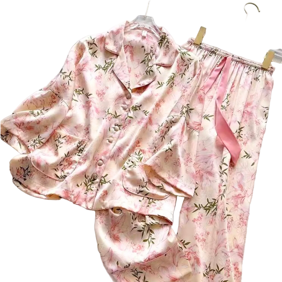 Floral pajama set with a pink ribbon on a light background