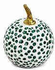 A decorative pumpkin-shaped object with a glossy white surface covered in green spotted pattern and a metallic gold stem, shown on a plain white background.