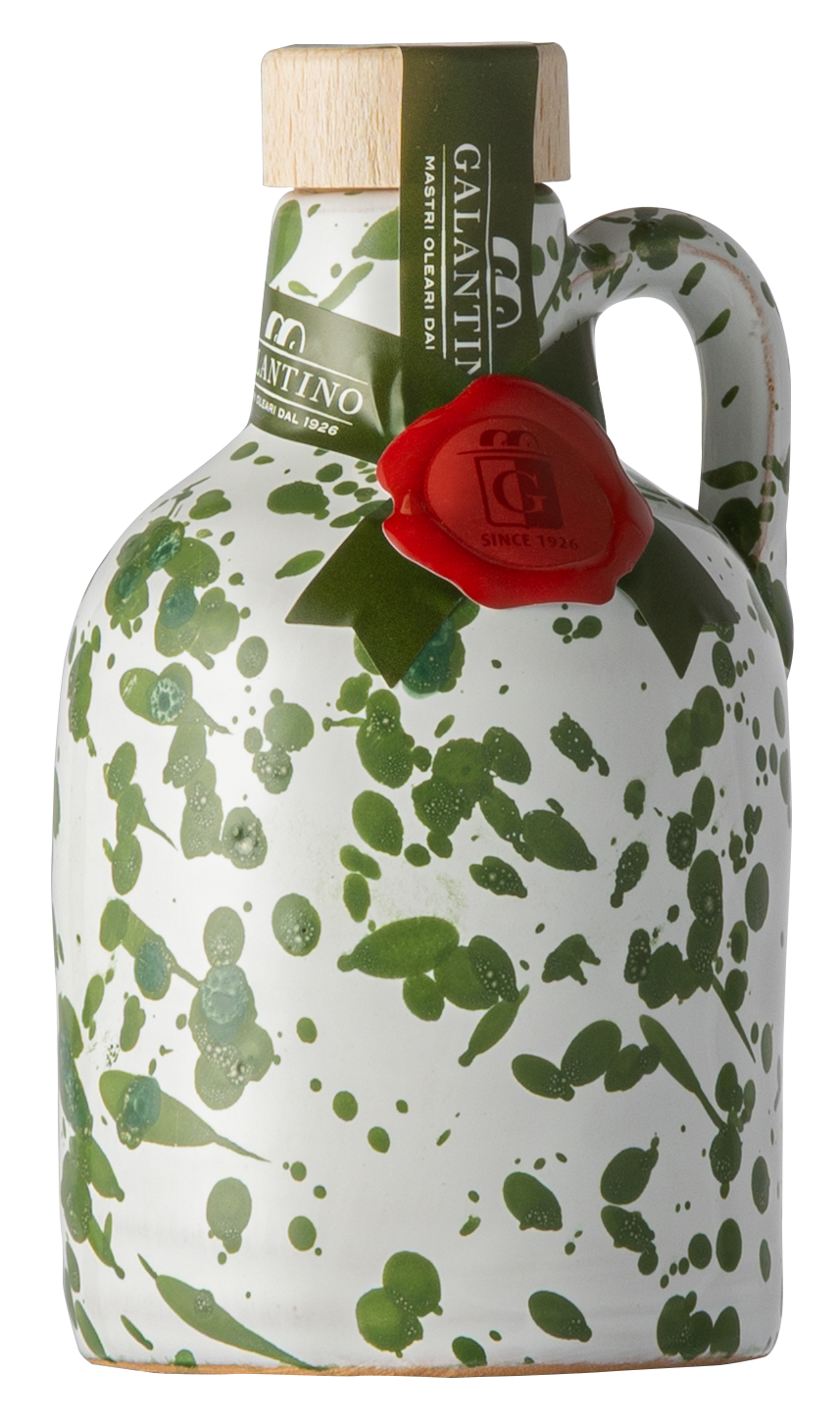 A ceramic bottle of Galantino Olive Oil, featuring a white speckled body with green leaf patterns, a wooden cap, and a red wax seal.
