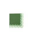 Green scalloped edge napkin on a white background