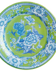 Blue Chinoiserie design on a green background paper plate