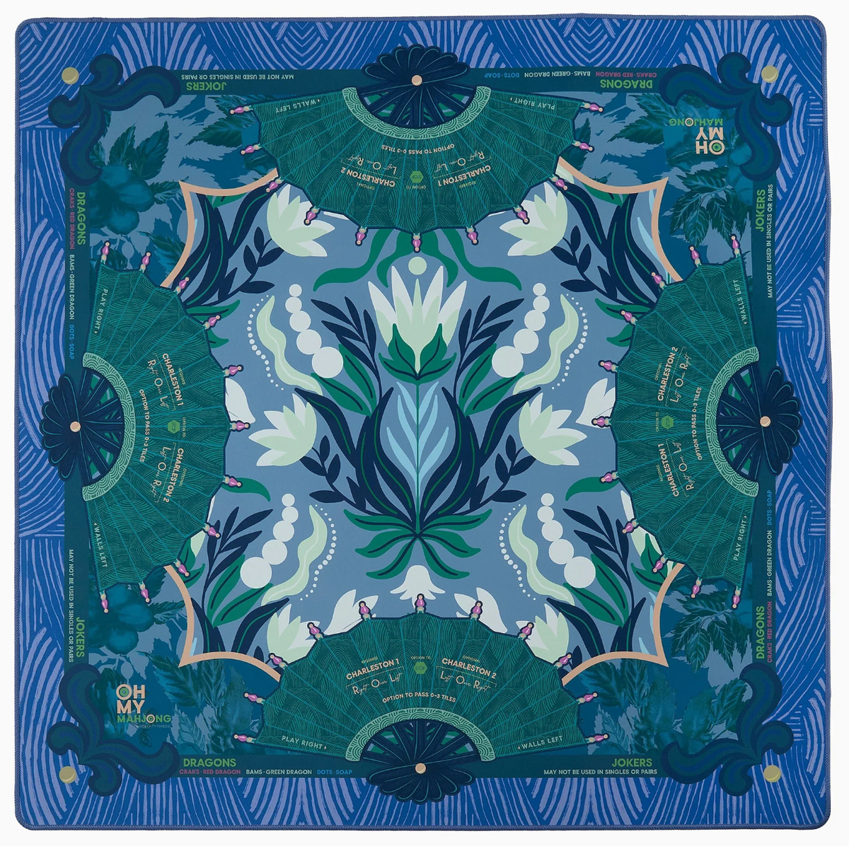Decorative mat with floral and fan design on a blue background