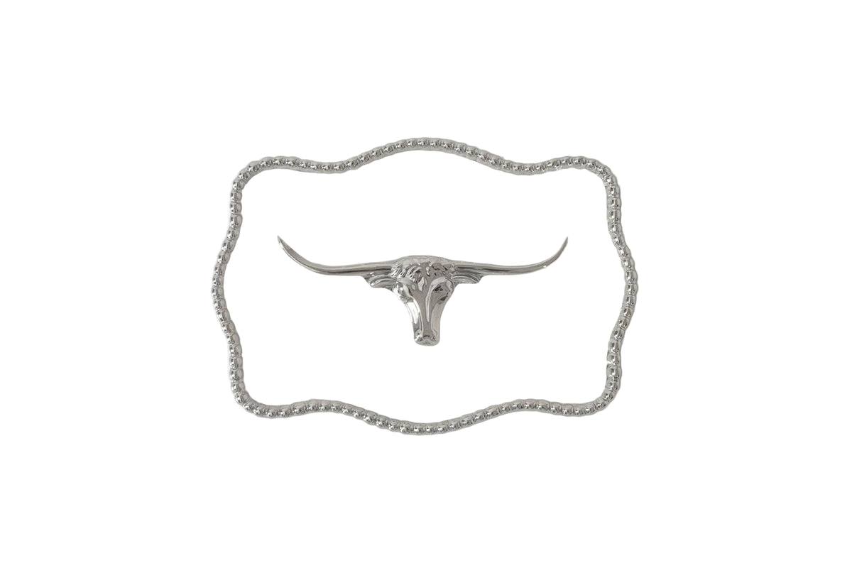A white porcelain tray with a silver Longhorn design and lustrous silver beads around the edge.