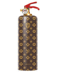 Decorative fire extinguisher with gold star and shield pattern on a brown background