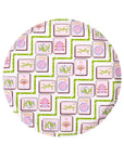 A round decorative plate featuring a Chinese mahjong tile pattern with pink, green, and white tiles on a white background.