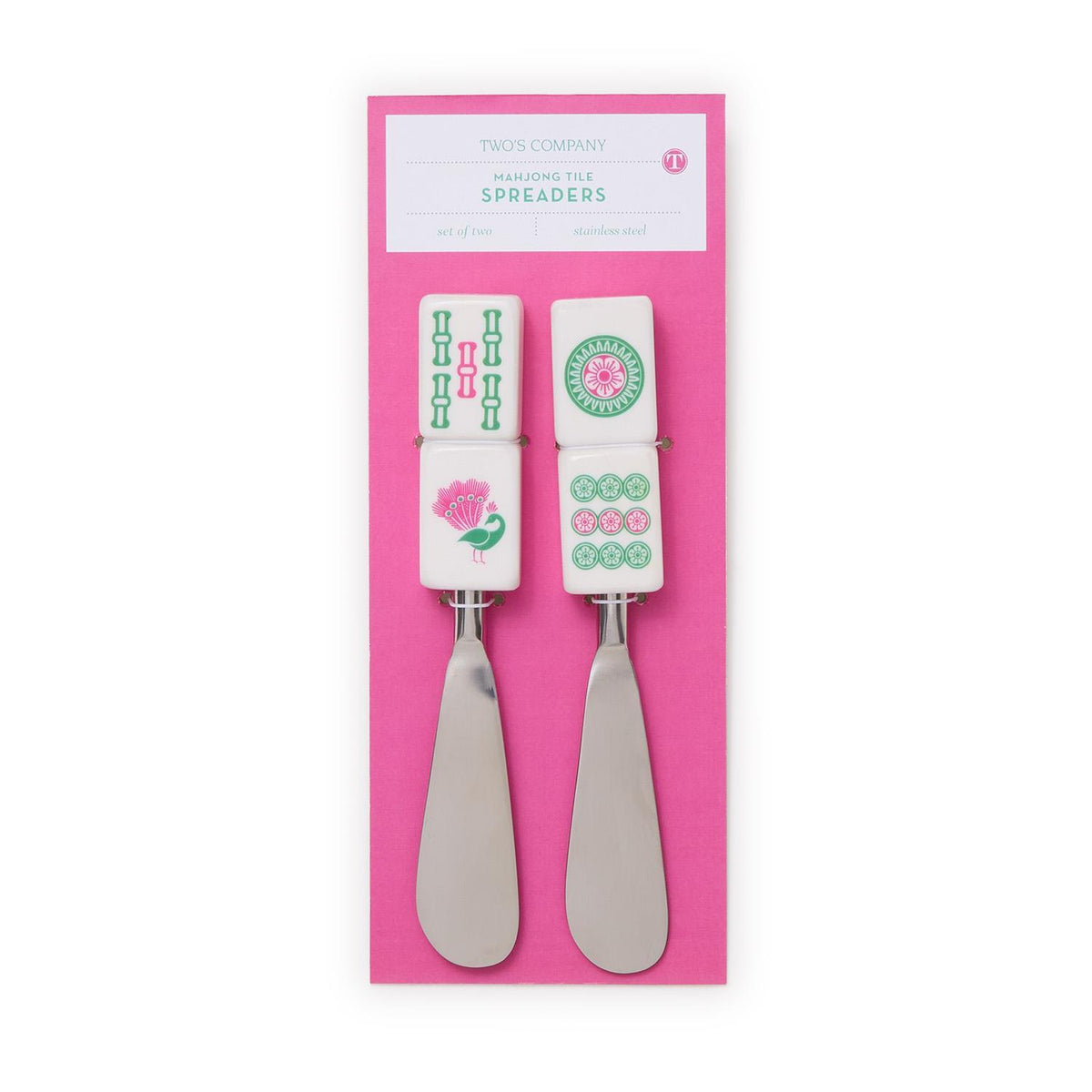 Two mahjong spreaders with decorative handles on a pink background