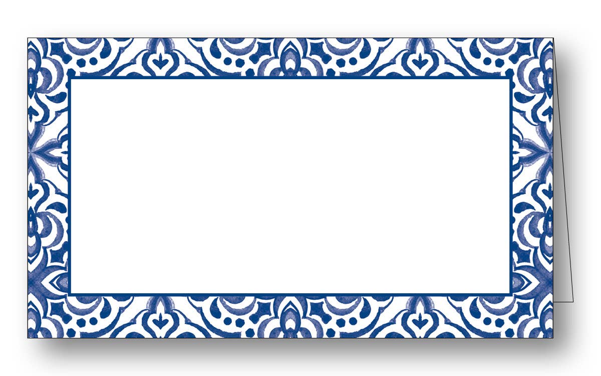 A folded white paper place card with a blue floral pattern border.
