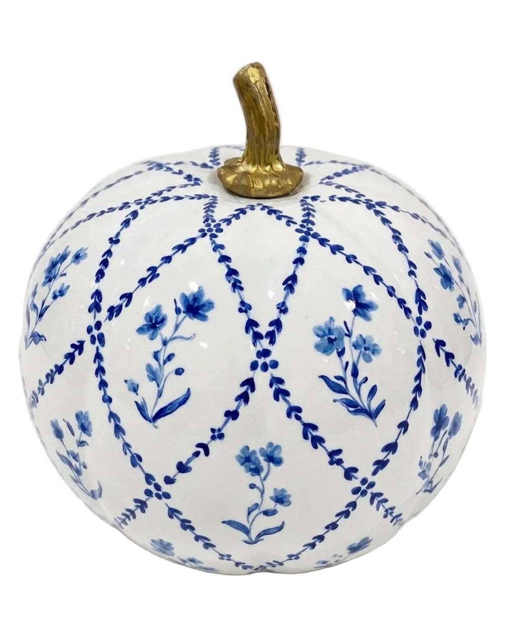 A decorative ceramic pumpkin with a white glaze, decorated with a blue floral and lattice pattern, and featuring a textured gold stem.