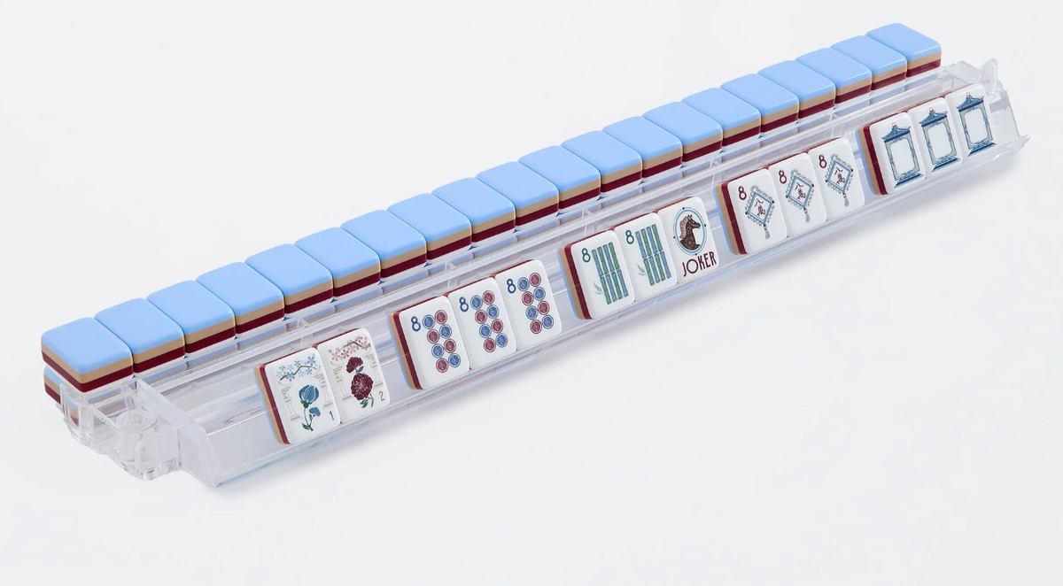 Osler Mahjong tiles displayed on an acrylic rack