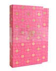 Pink with gold foil box that contains notebooks