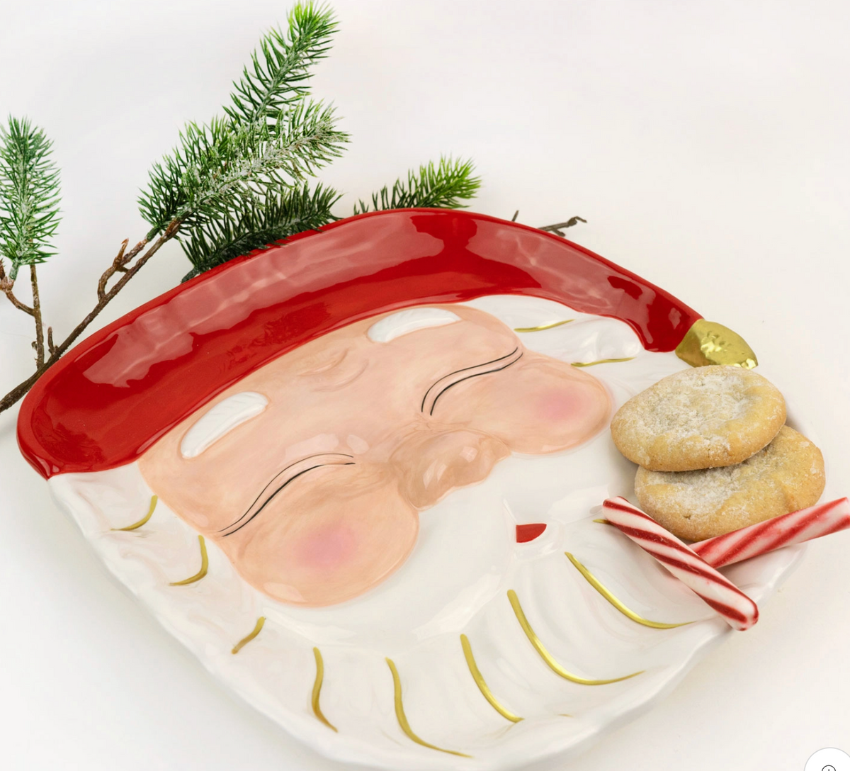 Santa serving platter showing candy canes, cookies and greenery