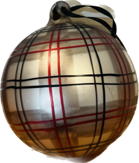 Round ornament with plaid pattern on a white background