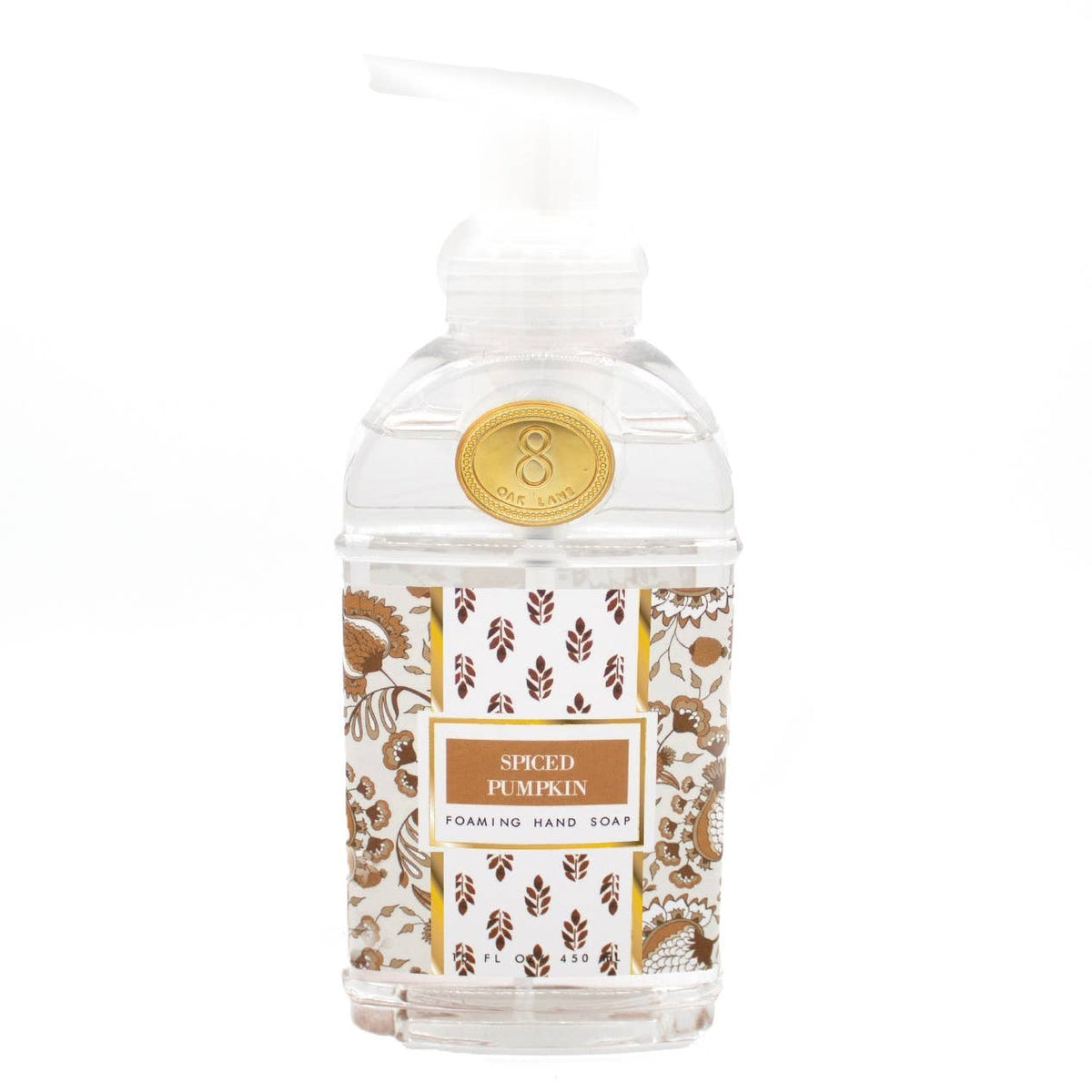 Foaming hand soap bottle with decorative label on a white background