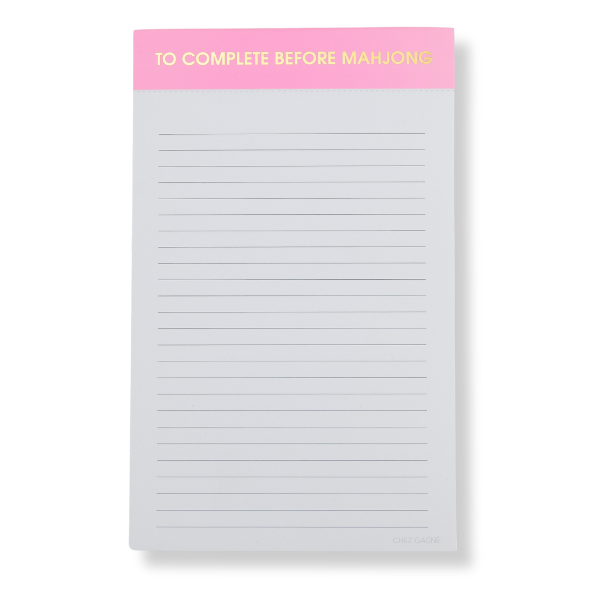 Notepad with pink top section and text 'To Complete Before Mahjong' on a white background