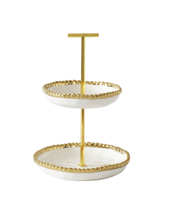 A white and gold 2-tier mini stand with gold beading on the porcelain surfaces, designed for serving appetizers or desserts.