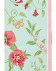 Floral design with pink flowers, green leaves, and red berries on a light blue background guest towel napkin