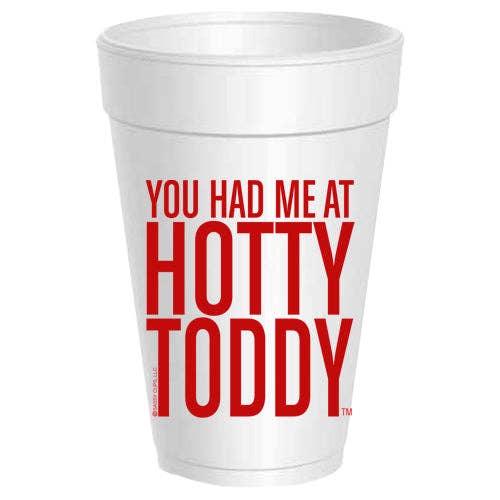 White styrofoam cup with red text 'YOU HAD ME AT HOTTY TODDY' on a white background