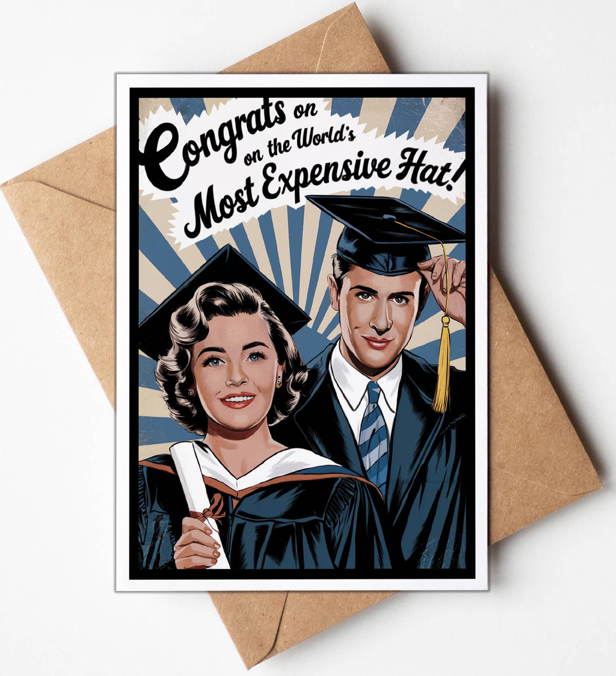 Graduation-themed card with a couple in caps and gowns, text 'Congrats on the World's Most Expensive Hat', and a brown envelope.